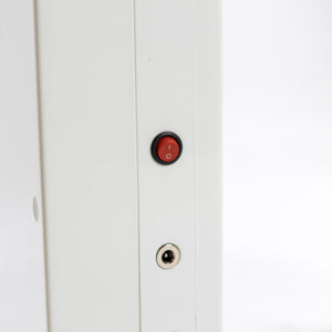 The button to turn the remote control for the toilet lift on/off